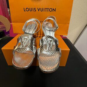 Louis Vuitton Isola Sandals in metallic “Argent” silve